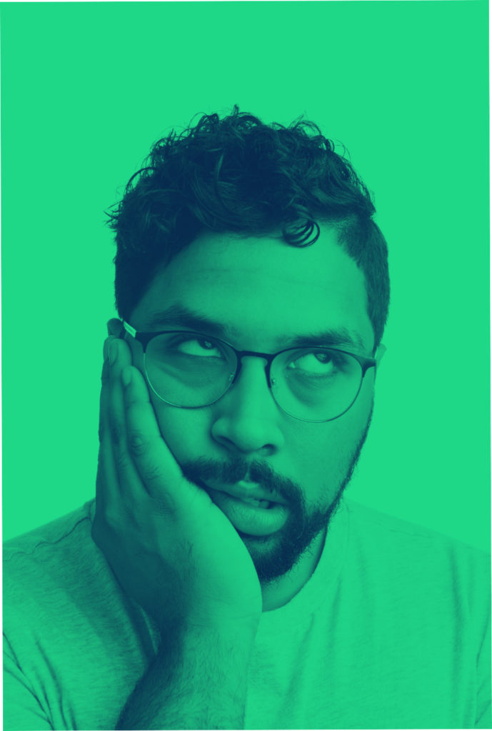 Man thinking with hand on face